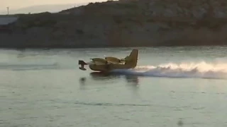 Canadair CL-415 water bombers, and idiots with boats