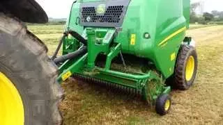 John Deere F440R Round Baler Showing how well Drop Floor Works.