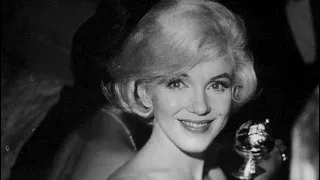Marilyn Monroe receiving a Golden Globe in March 1960.