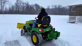 John Deere X758 Plowing Snow