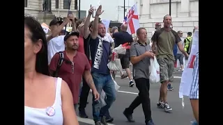 Tensions and tempers run high on pro-Trump, pro-Tommy Robinson rally