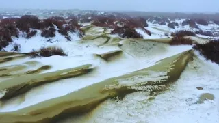 Snow covering Taklimakan desert in northwest China