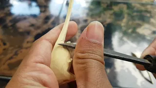 Carving a cute wooden little mouse