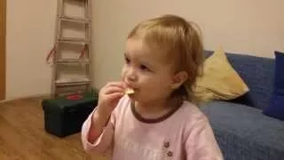 Baby tastes lemon for the first time. Малыш кушает лимон. Small baby eats a lemon.