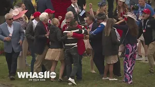 Trainer Eric Reed celebrates after long-shot Rich Strike's upset Kentucky Derby win