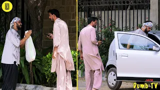 Beggar Sitting in His Car