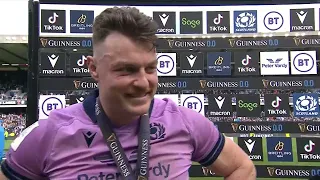 Jack Dempsey reacts to Scotland's win over Italy