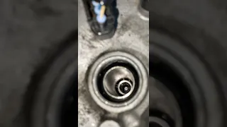 what do i do when my spark plug socket is stuck 5 inches deep inside a hole on a 09 corolla?