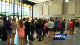 Teacher surprise students with notes on lockers