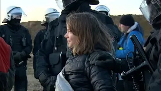 Swedish climate activist Greta Thunberg led away by police at coal mine protest