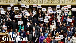 French politicians protest as controversial immigration bill passed