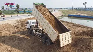 EP03 Filling up land Processing Dump truck with Bulldozer LiuGong Push soil into water clearing land