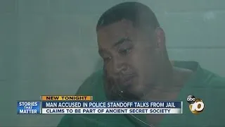 Man accused in police standoff talks from jail