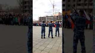 Три залповых выстрела на митинге в честь автопробега Росгвардии