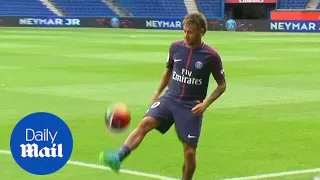 PSG new boy Neymar holds his new shirt and shows off his skills - Daily Mail