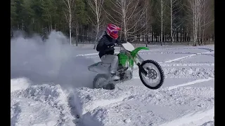 Kawasaki 450 plowing snow in March