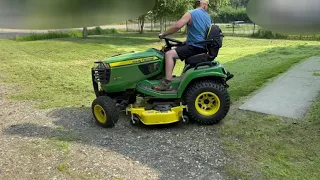 John Deere X758 Cutting An Overgrown Yard