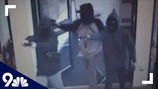 Surveillance video shows armed gunmen storm Colorado bank, flee with cash in red Lexus