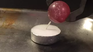 1000 DEGREE METAL BALL vs. TEA CANDLE