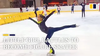 Little girl battles to become figure skater in China