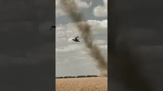 Ukrainian Mi-24 firing rockets at Russian positions