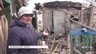 Мешканці Золотого розповіли, як пережили важку ніч / репортаж з передової