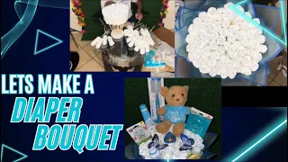 Let’s practice making a diaper bouquet