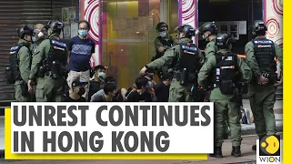 Hong Kong police fire pepper balls at protesters opposing postponement of local elections