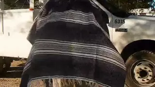 Making a poncho from a horse blanket..wmv