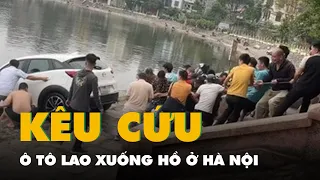 Ô tô lao xuống hồ ở Hà Nội, tài xế mở cửa xe giơ tay kêu cứu
