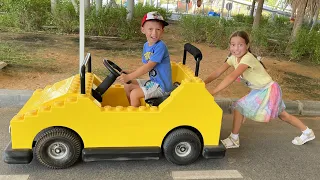 Sofia and Max fun play time at the Amusement Park and ride on Kids Cars