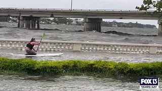 Florida man paddles down flooded Tampa street after Hurricane Idalia