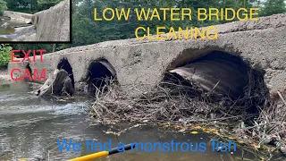 unclogging low water bridge with tons of debris/rusted out culverts 06/2023