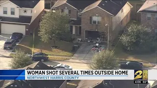 Woman shot several times outside home