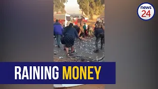 WATCH | Residents scramble for money following alleged cash-in-transit bombing