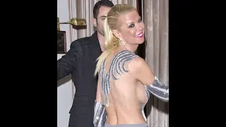 Tara Reid flashes her sideb**b in a semi-sheer sparkling gown