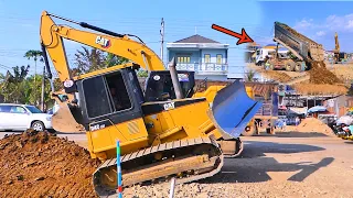 Project building road big SHANTUI Bulldozer and Dump Truck spreading rock looks to the best