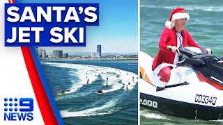 Santa swaps the snow for the sea | 9 News Australia