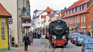 Steam Train driving on a Street | Molli-Bahn in Bad Doberan | Germany