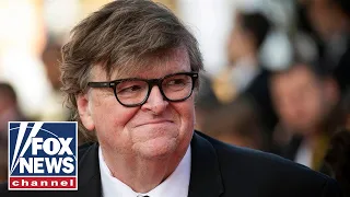 Michael Moore urges Michelle Obama to run for president