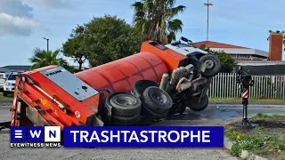 Refuse compactor truck gets comfy in Lavender Hill sinkhole