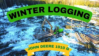John Deere 1910 G Forwarder: Master of Timber Loading in the Snowy Norwegian Forest