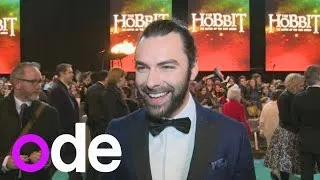 Aidan Turner talks about his man bun at The Hobbit premiere