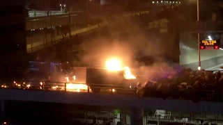 Hong Kong police vehicle bursts into flames after being hit by Molotov cocktail