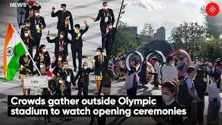 Crowds Gather Outside Olympic Stadium To Watch Opening Ceremonies