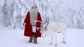 Santa Claus & reindeer in Pello Lapland: Merry Christmas and Happy New from reindeer land in Finland