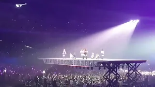 TWICE doing a dance break on top of a moving platform