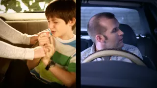 Man and Child Whine about Wearing Seat Belt