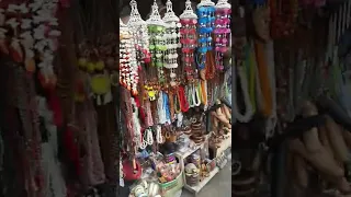 Shops in Tanah lot Sea shore Hindu temple Bali Indonesia