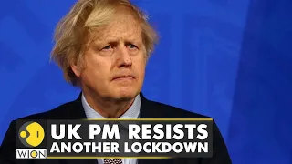 UK PM resists another lockdown, insists 'Plan B' is working amid record surge in COVID-19 cases